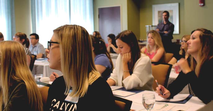 J-1 Teaching Assistants take notes during CICD's annual presentation